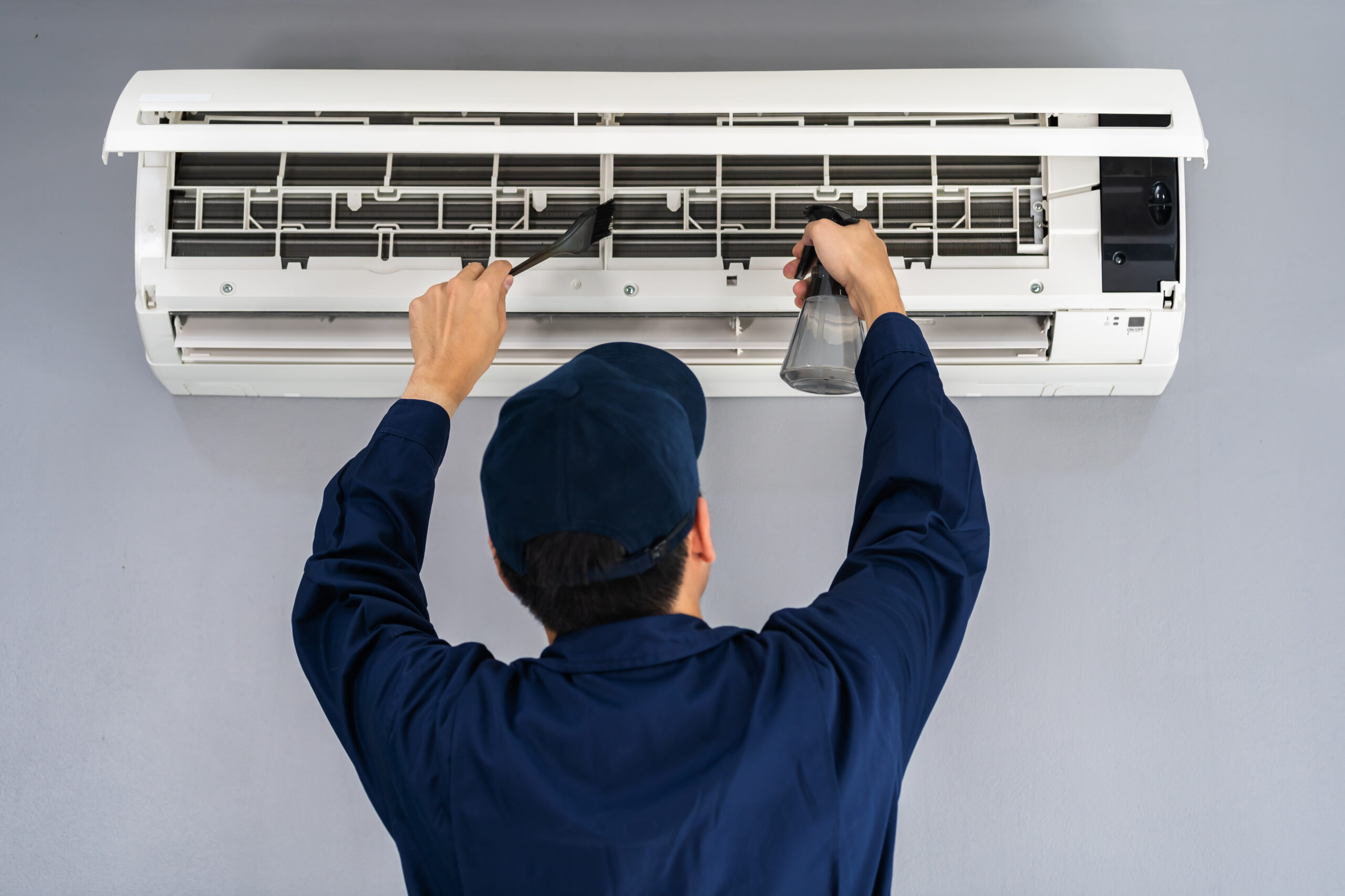 technician performing regular AC maintenance in Eastvale homes